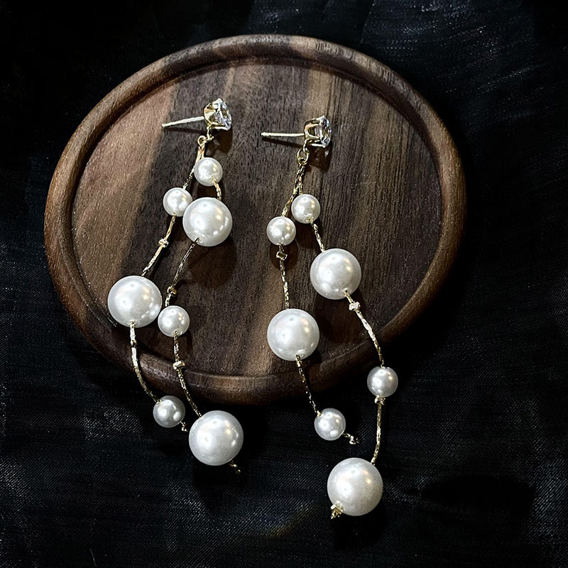 科技與時(shí)尚完美融合，最新長(zhǎng)款珍珠耳飾款式亮相！